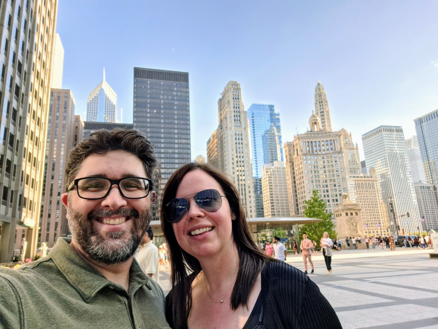 Zack and Emily smiling together in downtown Chicago on August 10, 2024